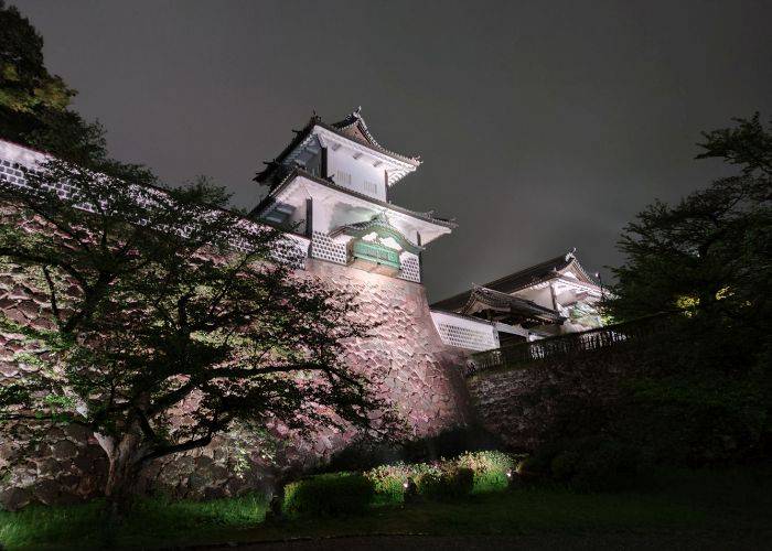 The splendor of Kanazawa Castle, lit up at night.